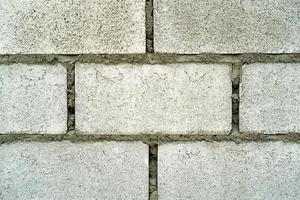 Abstract texture and background of concrete bricklayer wall at the construction site photo