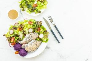 Grilled chicken breast meat steak with fresh vegetable photo