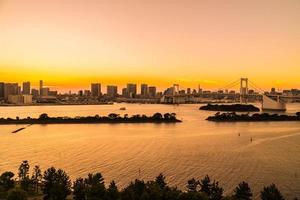 Cityscape of Tokyo city with Rainbow Bridge, Japan photo