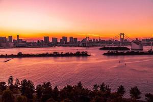 Cityscape of Tokyo city with Rainbow Bridge, Japan photo