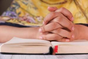 Close up of woman's hands praying photo