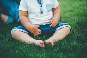 Little boy in the grass photo