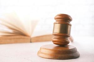 Gavel and book isolated on neutral background photo