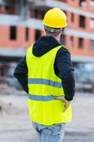 Building construction worker engineer posing photo