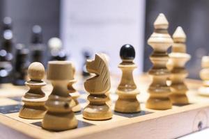 concepto de negocio de ajedrez, liderazgo y éxito foto