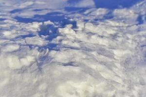 Snowy surface in winter with shadows in the evening photo