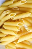 Yellow delicious pasta close-up from the store photo