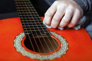 Acoustic guitar restoration close-up photo