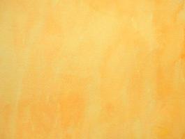 Pastel grunge yellow color watercolor texture background. photo