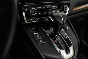 Details of stylish car interior, leather interior. Automatic transmission