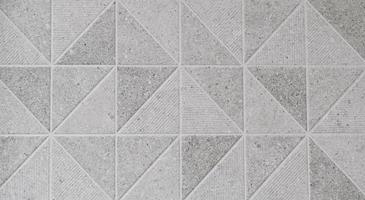 Texture of decorative tiles forming triangles photo