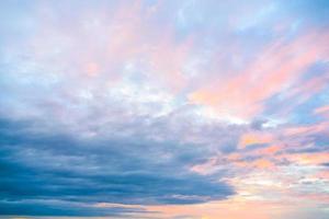 Cloudy sky at sunset photo