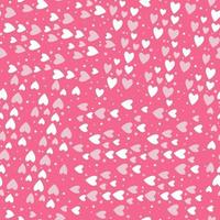 Seamless vector pattern of small randomly scattered hearts and dots