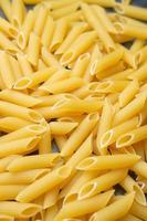 Dry penne pasta photo
