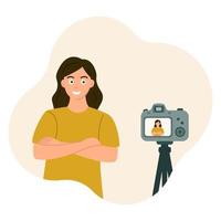 The girl crossed her arms and smiled at the camera. Photos and videos from a tripod, posing. vector