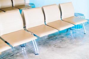 Empty chairs in hotel lobby photo