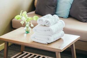Stack of towels on table photo