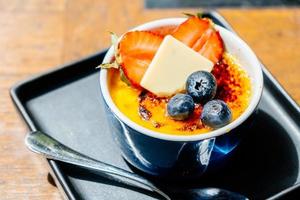 Sweet dessert with cream brulee photo