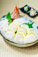 Raw and fresh sashimi set with hotate oyster and prawn or shrimp photo