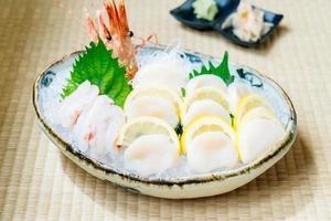 Raw and fresh sashimi set with hotate oyster and prawn or shrimp photo