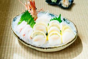 Raw and fresh sashimi set with hotate oyster and prawn or shrimp photo
