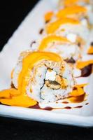 Eel sushi roll maki with cheese photo