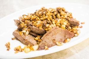 Fried pork liver with garlic photo