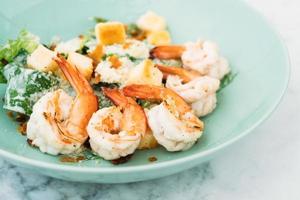 Caesar salad with shrimp or prawn photo