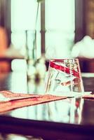 Selective focus point on glass in restaurant photo