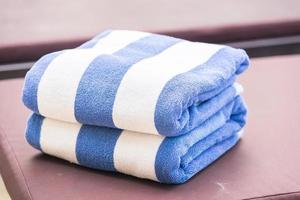 Towel on bed at the pool photo