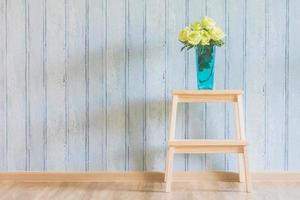 Vase at the wooden wall photo