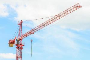 Crane at construction site photo