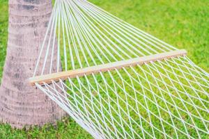Selective focus point on hammock with green grass background - Filter effect processing photo