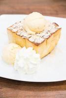 Honey toast with ice cream and honey syrup photo