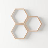 Estante hexagonal de madera con espacio de copia para maqueta sobre fondo aislado foto