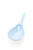 Plastic ladle spoon isolated on white background photo