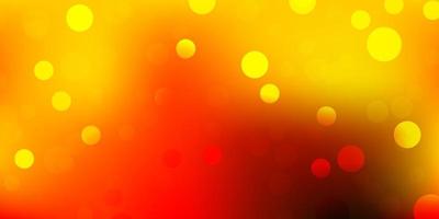 Light red, yellow vector background with spots.