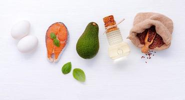 Ingredients for healthy foods selection on white wooden background photo