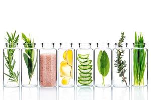 Alternative skin care in glass bottles isolate on white background photo
