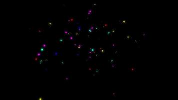 naadloze loops glanzende kleurrijke heldere confetti op zwarte achtergrond video