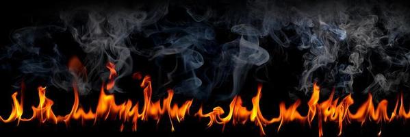 Fire flames with smoke isolated black background photo