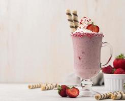 Front view strawberry milkshake with copy space photo