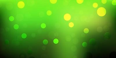 Light green, yellow vector backdrop with dots.