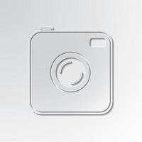 Old photocamera cut out icon on paper background vector