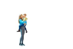 Miniature people, mother holding her cute baby son in the arms on white background with clipping path photo
