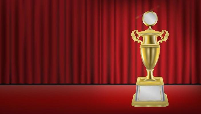 golden trophy with red curtain background