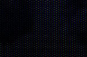 Abstract background pattern of colored blurry dots on a dark background close up photo
