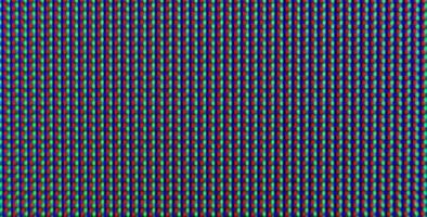 Abstract background pattern of colored blurry dots on a dark background close up photo