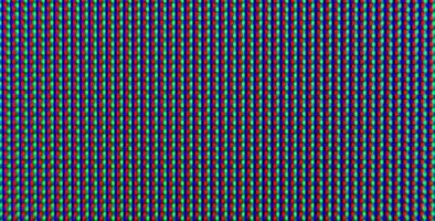 Abstract background pattern of colored blurry dots on a dark background close up photo