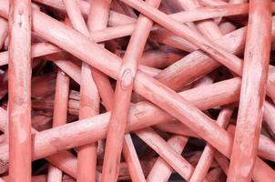 Red wooden rattan, macro close up, abstract background photo